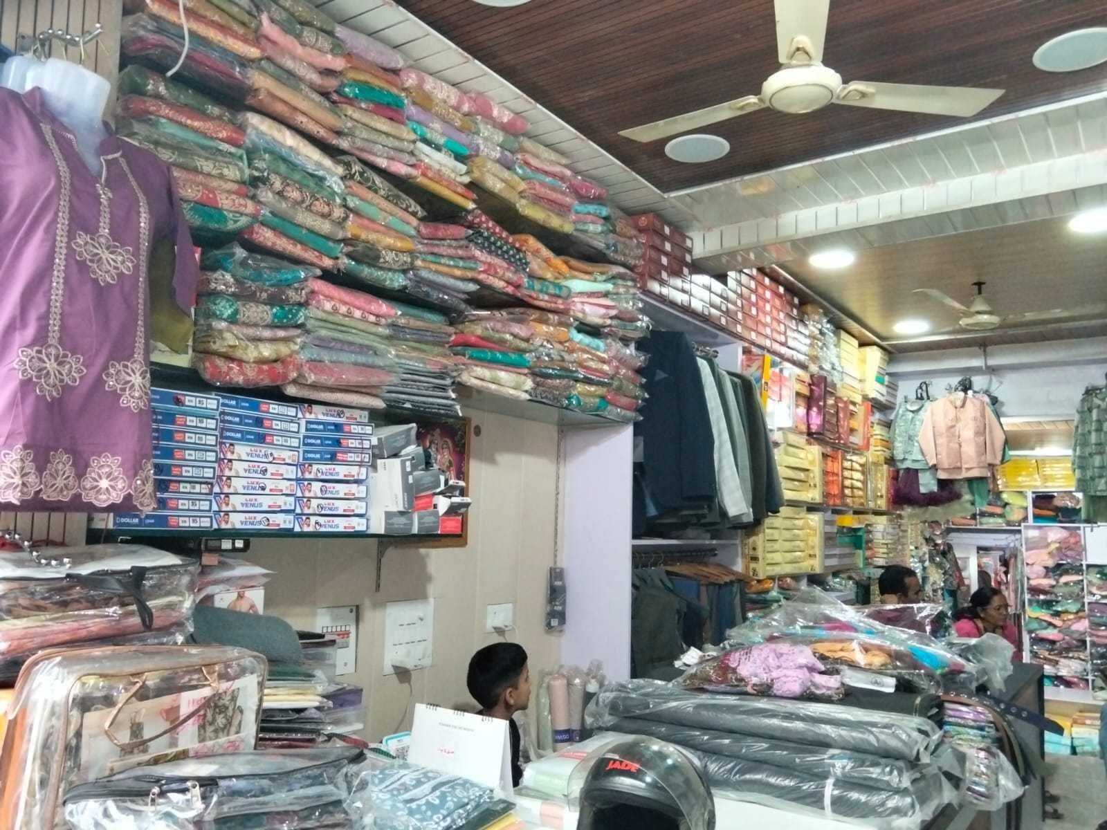 Colorful bridal and partywear dress collection inside Fine Jeans Tailor & Cloth House